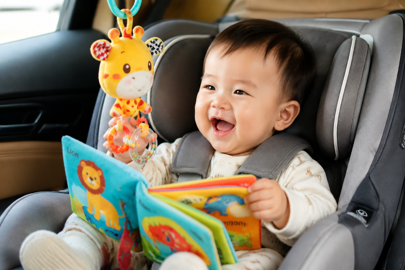 A lovely Chinese baby (10 months old) sitting happily in a car seat, playing with a colorful soft cloth book and a plush hanging rattle. The baby is smiling brightly, fully engaged. Soft plush materials, vivid colors. Interior of a modern car, bright daytime lighting, shallow depth of field focusing on the baby and the toy. Professional photography, high quality, joyful mood. --ar 3:4 --v 6.0
