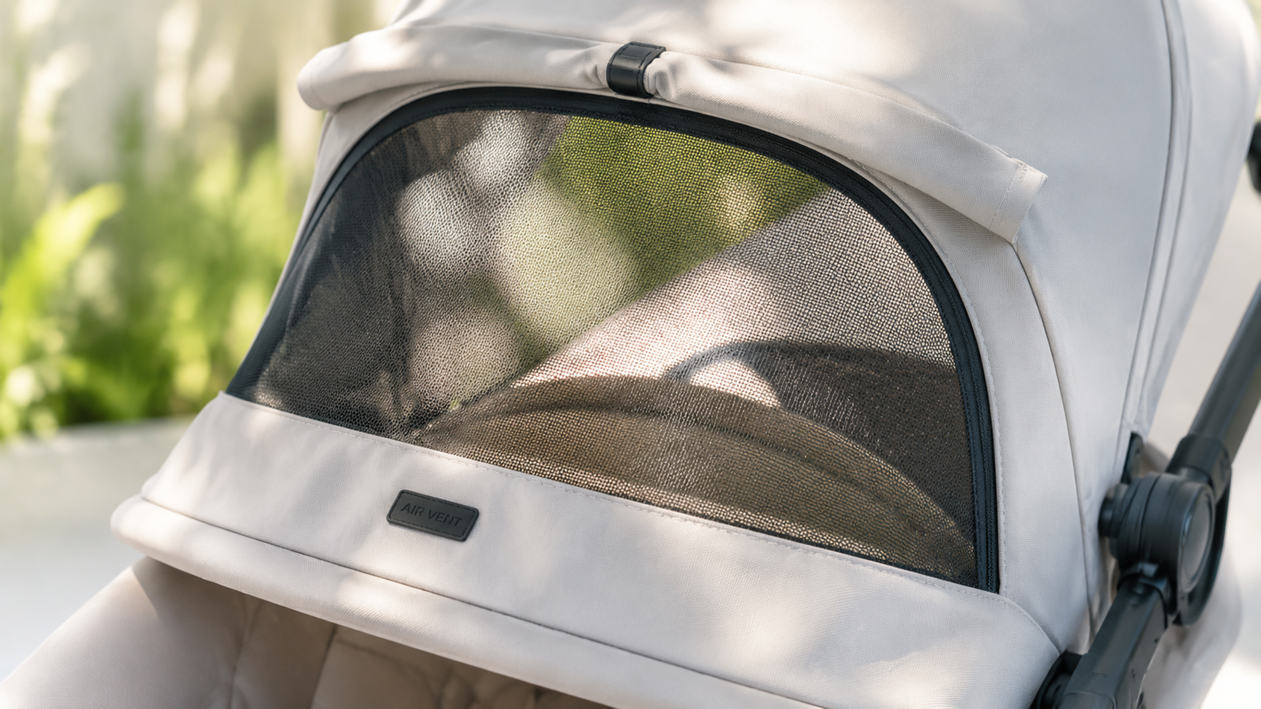 Close-up shot of a modern baby stroller canopy wit