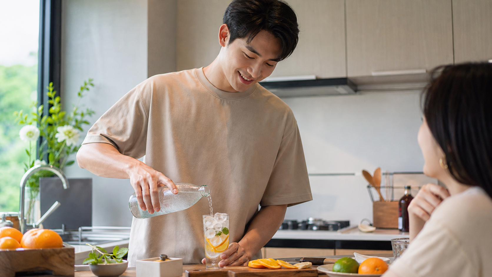 A handsome young Chinese husband standing in a mod