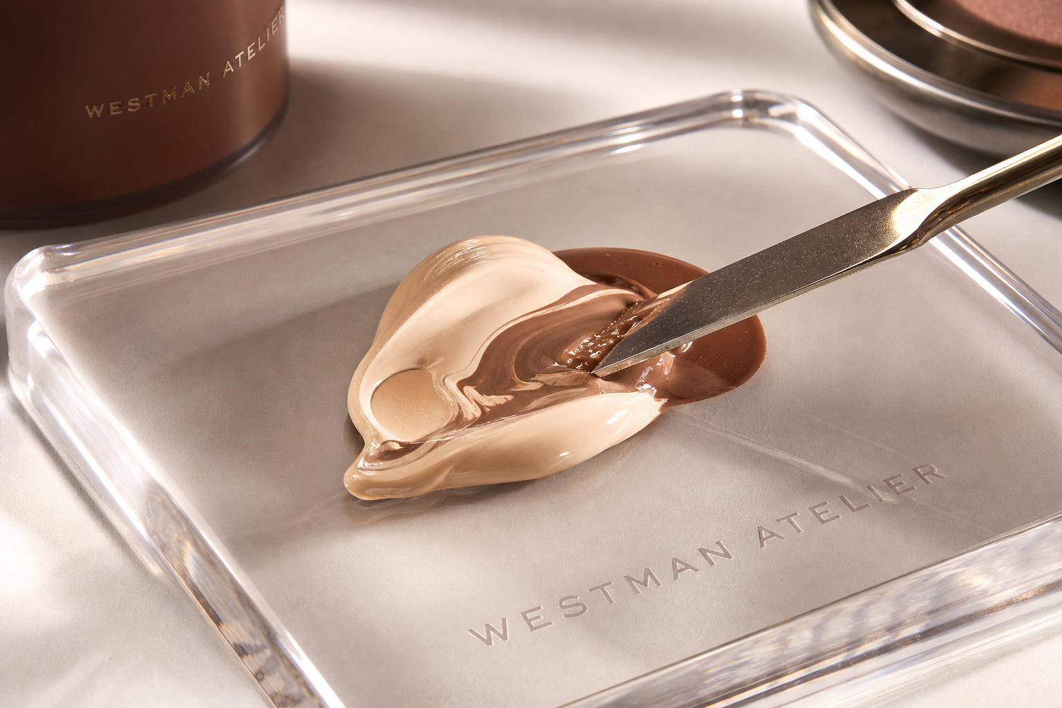 A close-up aesthetic shot of a clear makeup mixing