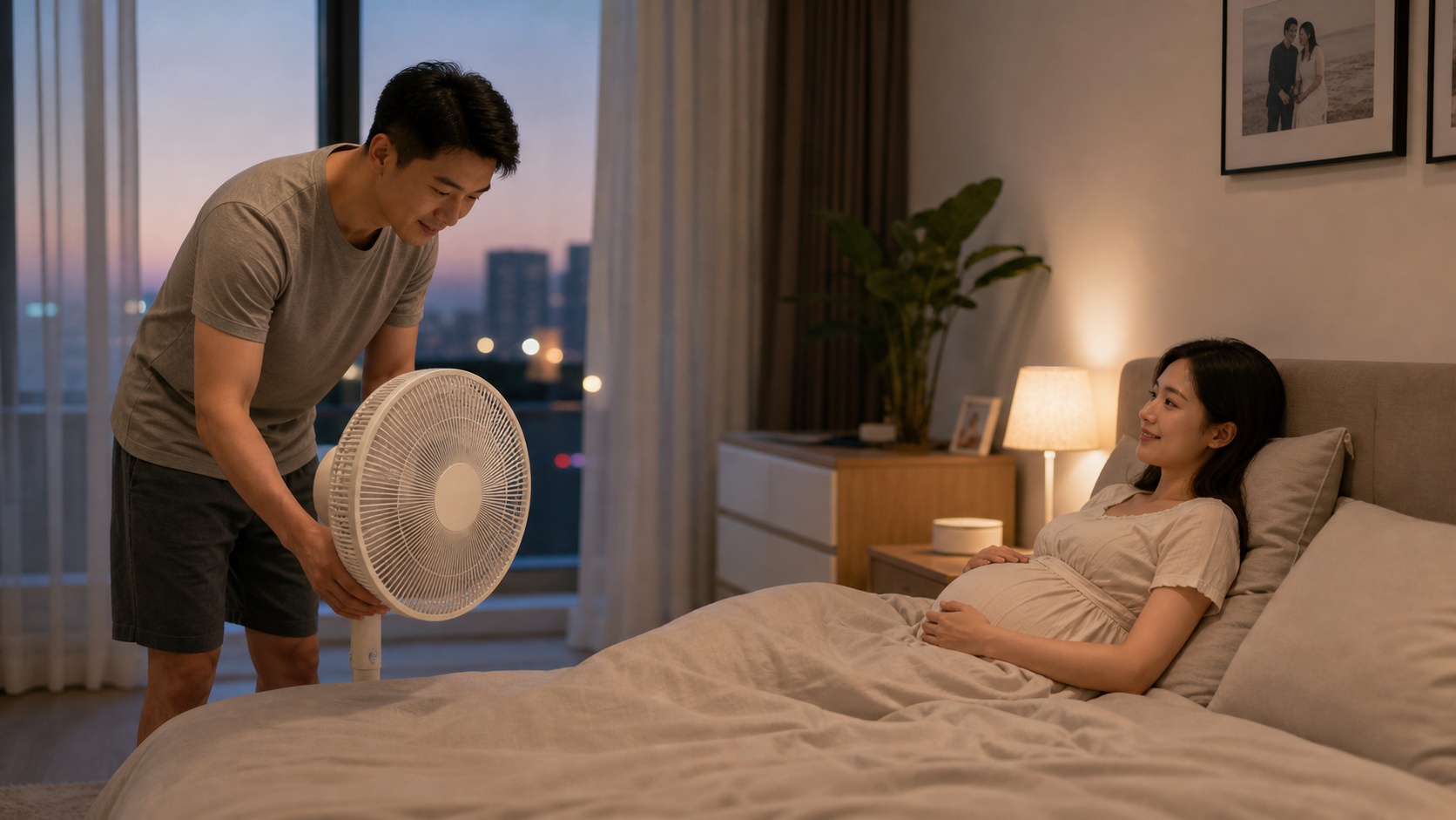 A caring Chinese husband adjusting a circulating f